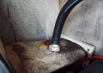 Reulator 26 center console boat has a live well hose that is not connected properly to the scupper drain