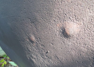 Osmotic blisters on 1980's fiberglass sloop. Marine Survey revealed that these were dry and about the size of a quarter.