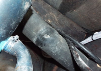 Lobster Boat Survey reveals bulging diesel engine exhaust hose that is ready to fail and possibly rupture