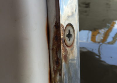 Sailing Catamaran chain plate with crevice corrosion has cracked the chain plate which anchors the backstay